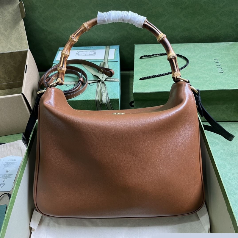 G*u*i top handle bags